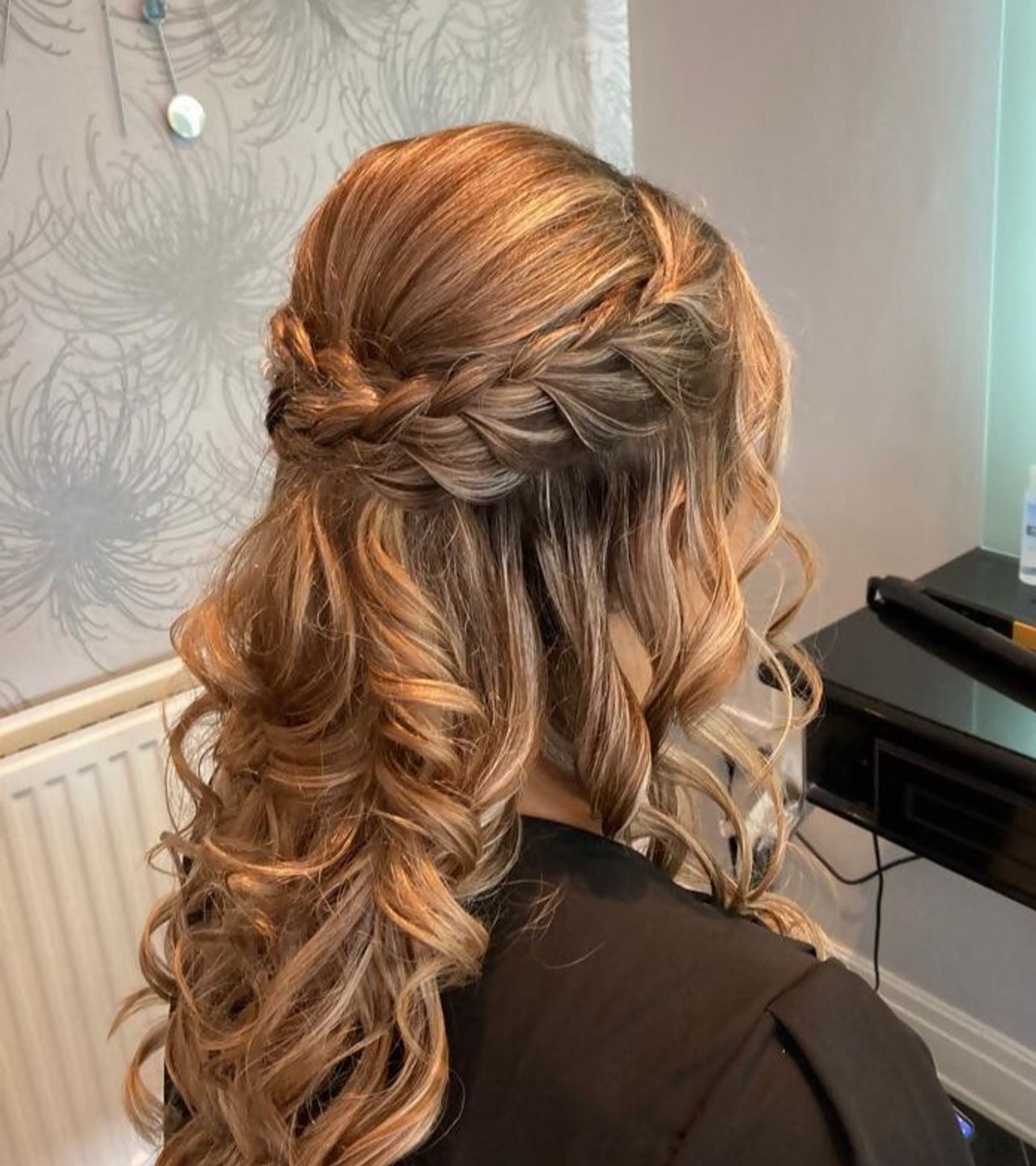 An intricate curled hairstyle created at Headstart in Scarborough