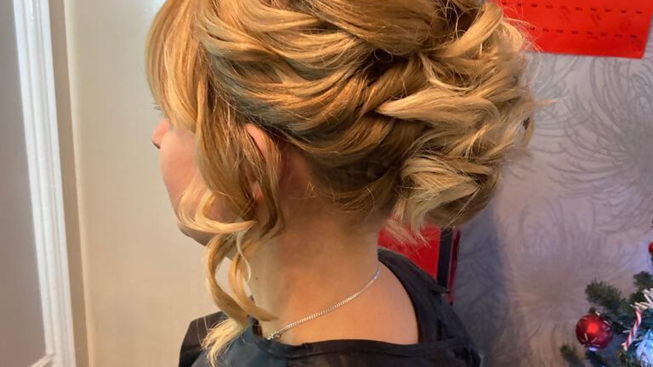 An occasion updo created at Headstart